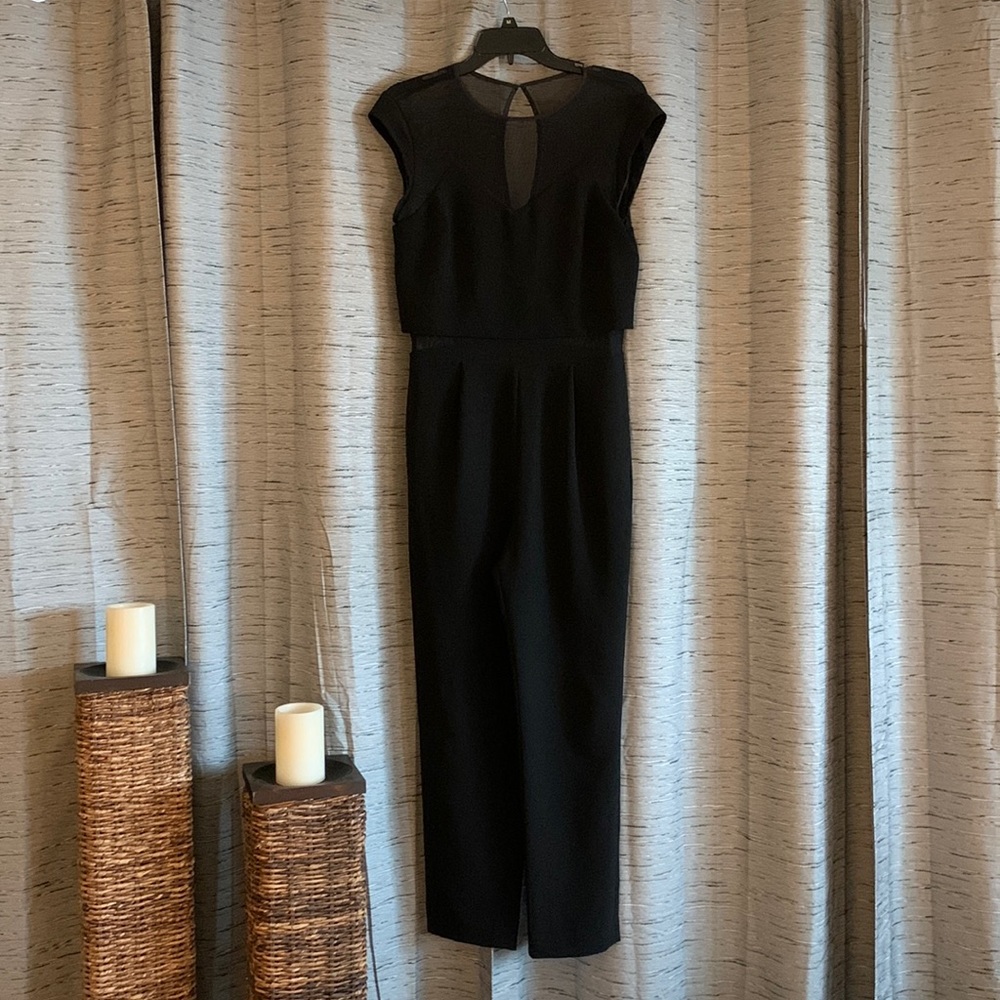 Black EXPRESS spandex romper, with mesh, size 6 womens